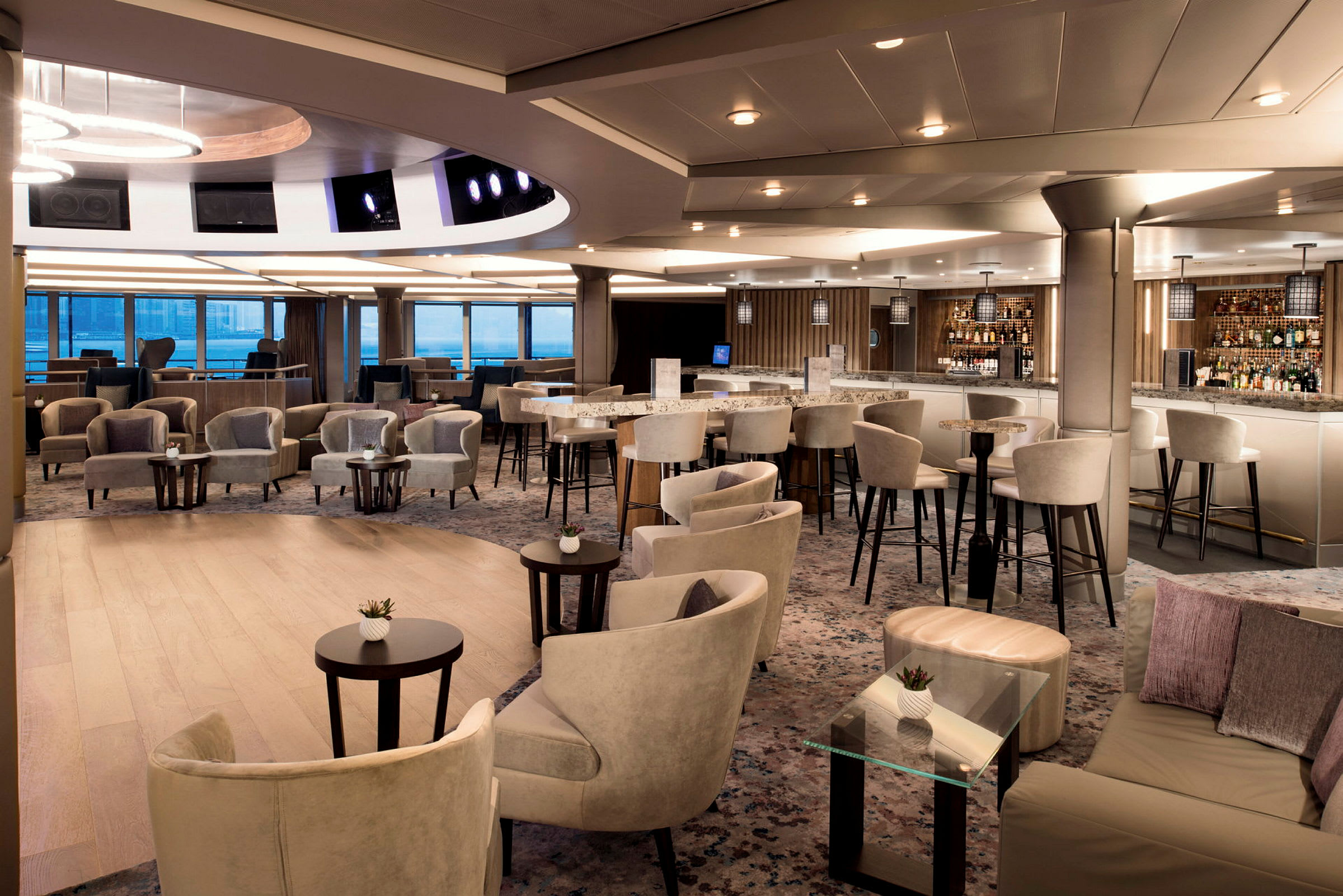 Interiör av en modern lounge med sittplatser och en bar. (AI-genererad text)
