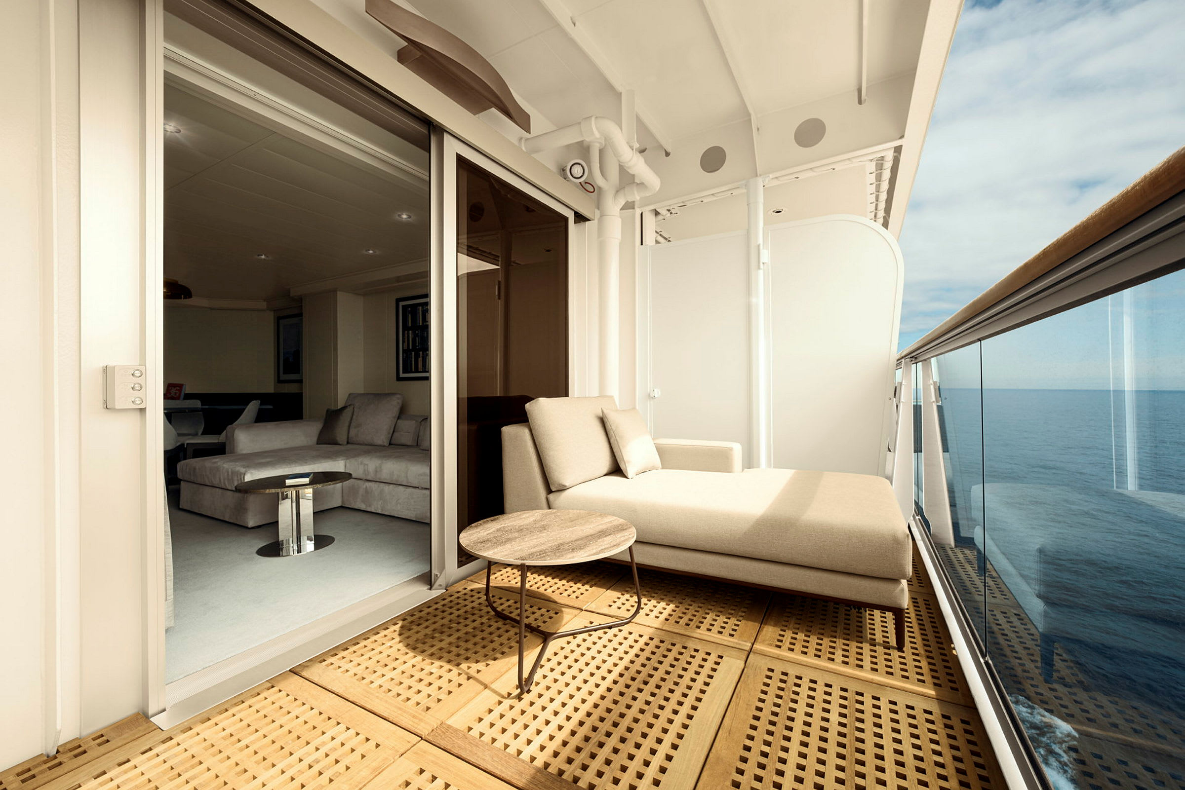 Privat balkong med sittmöbler och utsikt över havet. (AI-genererad text)