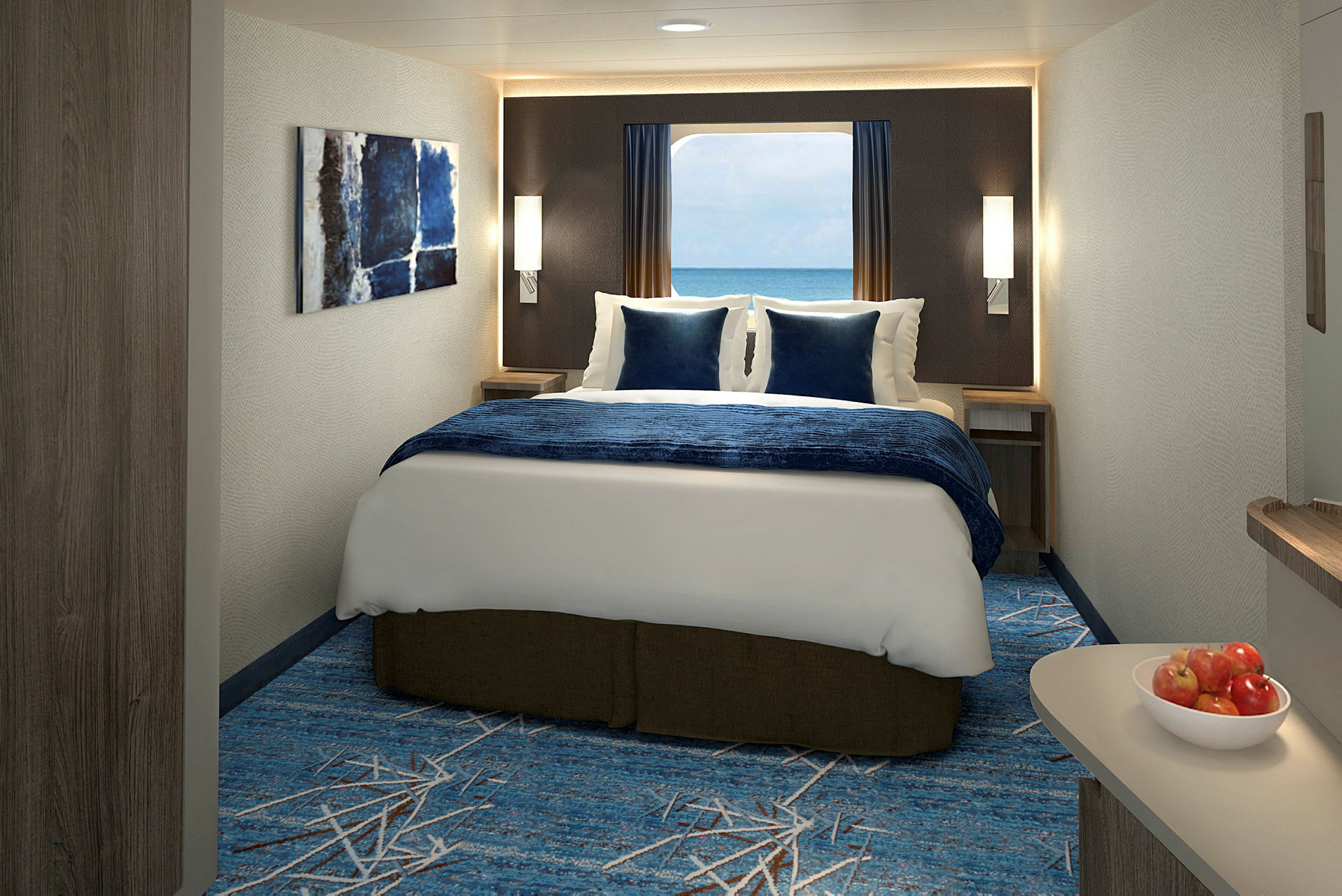 Modern hotellrum med säng, havsutsikt genom fönster och skål med äpplen på bordet. (AI-genererad text)